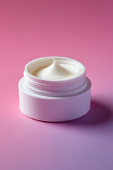 cosmetic cream on pink background