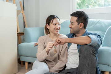 Moving house, relocation. Happy and smile Couple help set and move furniture for new apartment,...