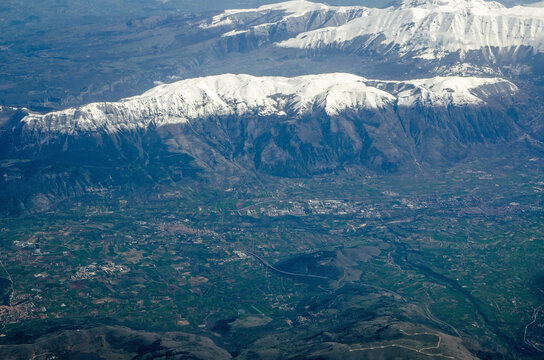 Aerial view of Sulmona beneath the Gran Sasso Massif in the Appenine Mountains