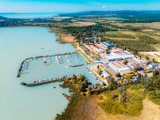 Lake Balaton in Hungary. Beach textures with boats with reeds and piers, aerial view. port at lake...