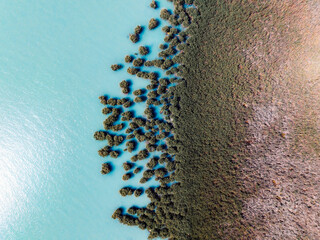 Lake Balaton in Hungary. Beach textures with boats with reeds and piers, aerial view near...