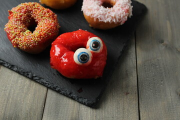 Halloween Cake with Blue Eyes on a Gray Tray Stand with Space for Copyspace Text