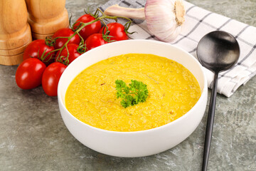 Vegetarian corn cream soup served parsley
