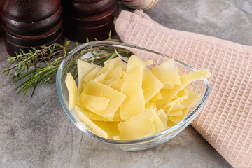 Parmesan cheese slices in the bowl