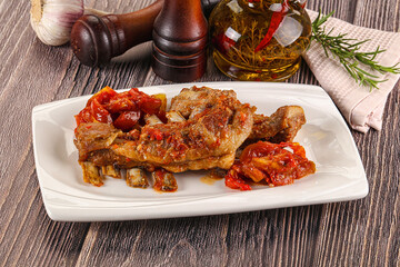 Baked lamb ribs with vegetables