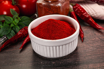 Spicy dry paprika powder in the bowl