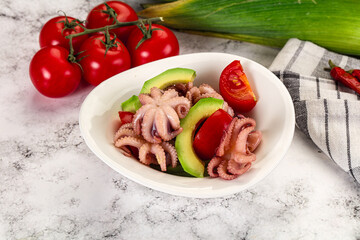Salad with baby octopus and avocado