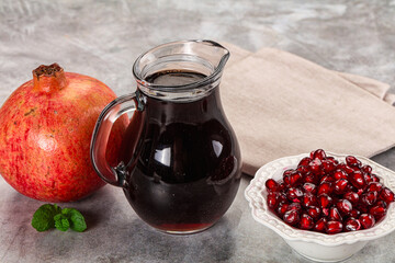 Sweet fresh pomegranate juice with fruit