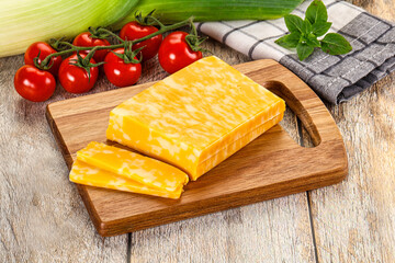 Marble yellow cheese with slices