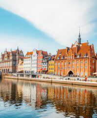 Fototapeta premium Gdansk with Motlawa river in Poland. Old town colourful house with Holy Spirit Gate