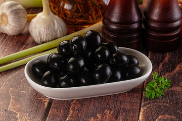 Mediterranean marinated Black olives in the bowl