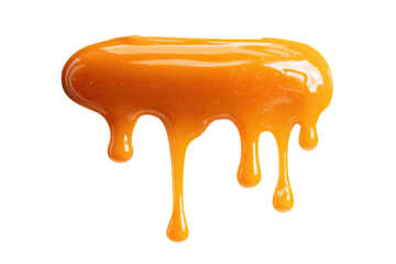 Caramel sauce dripping from a larger blob, isolated against black