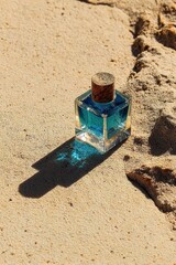 Blue Bottle on Sand