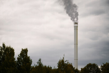 Industrial smoke plume rising from chimney