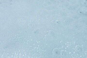 White frozen landscape with icy pond