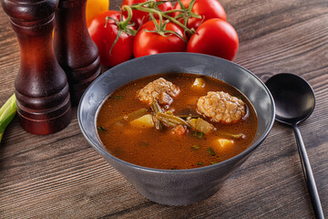 Tomato Soup with meatballs and vegetables