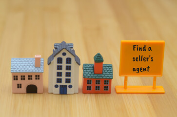 Find a Seller’s Agent Sign in Front Yard – Real Estate Marketing Concept