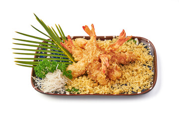 Crispy golden tempura shrimp served on decorative plate with shredded radish, parsley garnish, and palm leaf for presentation, surrounded by crunchy tempura flakes