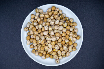 Beautiful organic dried chickpea beans consisting of raw bengal legume pea