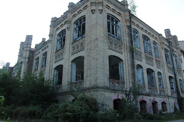 a dilapidated building. The consequence of the war. Forced migration