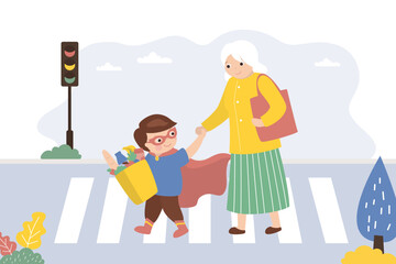People cross road at crosswalk. Pedestrian safety, people follow rules of road. Little boy helping grandmother carry shopping bags. Boy helper and aged woman.