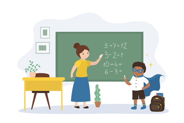 Teacher explains math. African american schoolboy stands at blackboard and solves mathematical examples. Math lesson, smart student calculate.