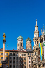 Fototapeta premium View on Marienplatz town hall and Frauenkirche in Munich, Germany
