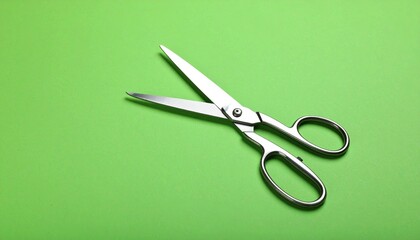 scissors on a green background