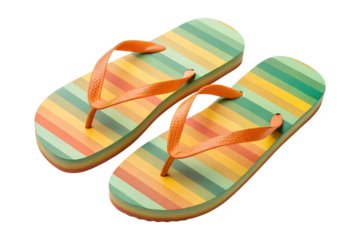 A vibrant pair of rainbow striped flip-flops with orange straps lies isolated on a transparent background, ready as a summer png.
