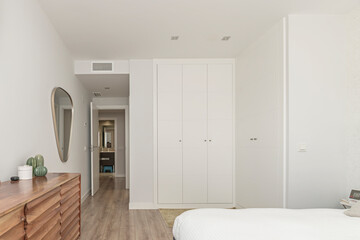 Relaxation corner: Bedroom with a double bed, decorative pillows, and a soft rug