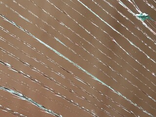 abstract background with spider web on broken mirror
