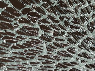abstract background with spider web on broken mirror