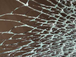 abstract background with spider web on broken mirror