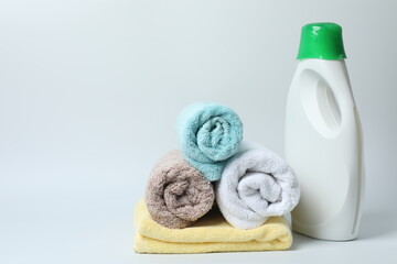 Towel and bathroom accessories on a white background