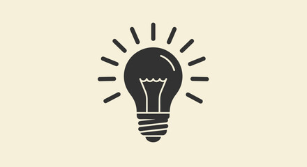 Simple light bulb icon with radiating lines in monochrome design