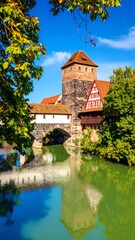 Obraz premium Autumnal European city riverside scene