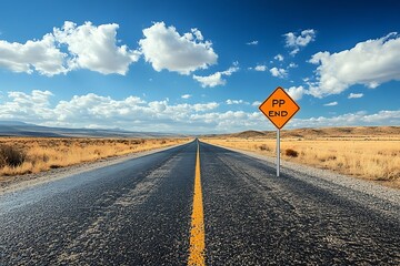 Empty desert highway with warning sign under blue sky