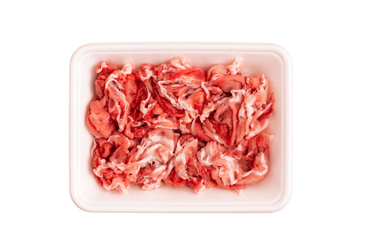 pork scraps in a food tray of polystyrene foam. 発泡スチロールの食品トレーに入った豚のこま切れ	
