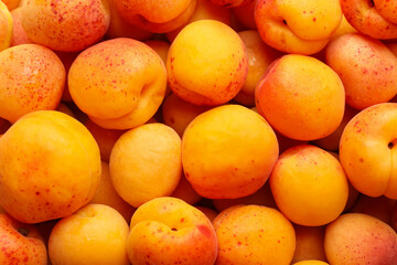 Fresh ripe sweet apricots as background, top view