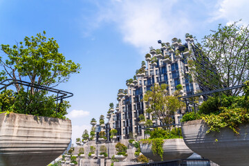 Shanghai. Modern architecture showcases greenery in Shanghai's urban landscape during daytime