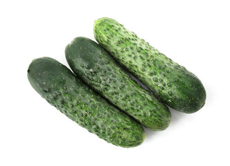 Three fresh green cucumbers isolated on white, top view