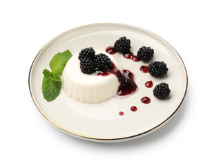 Tasty panna cotta with blackberries, mint and sauce isolated on white
