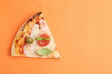 Slice of delicious pizza on orange background, top view. Space for text
