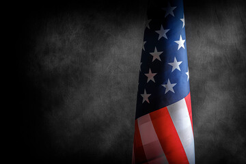 American flag against a dark textured background, highlighting its stars and stripes as a symbol of...