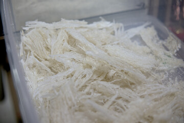 Premium edible bird's nests, meticulously cleaned and individually wrapped, reflecting a commitment to quality and purity.