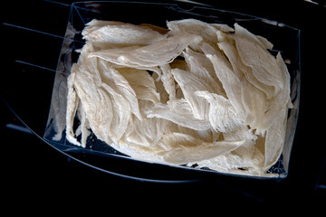 Premium edible bird's nests, meticulously cleaned and individually wrapped, reflecting a commitment to quality and purity.