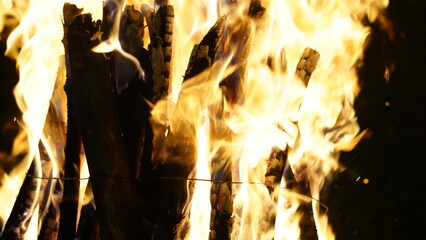 Intense Burning Fire with Darkened Logs and Flames
