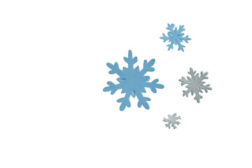 Four stylized snowflakes, light blue & grey, on black