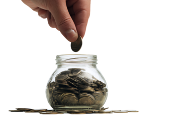 Hand dropping coin into glass jar. Financial savings.