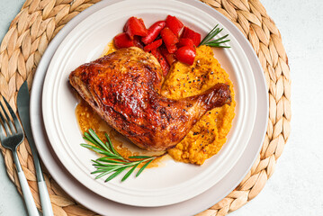 Autumn meal: roasted chicken quarter with mashed sweet potato